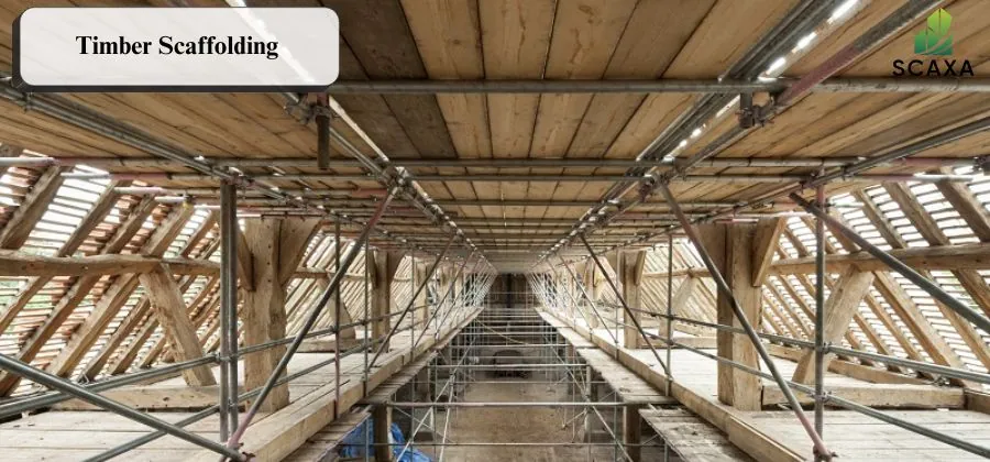 Timber scaffolding structure showcasing wooden platforms and metal supports, relevant to SCAXA's scaffolding services and construction solutions.
