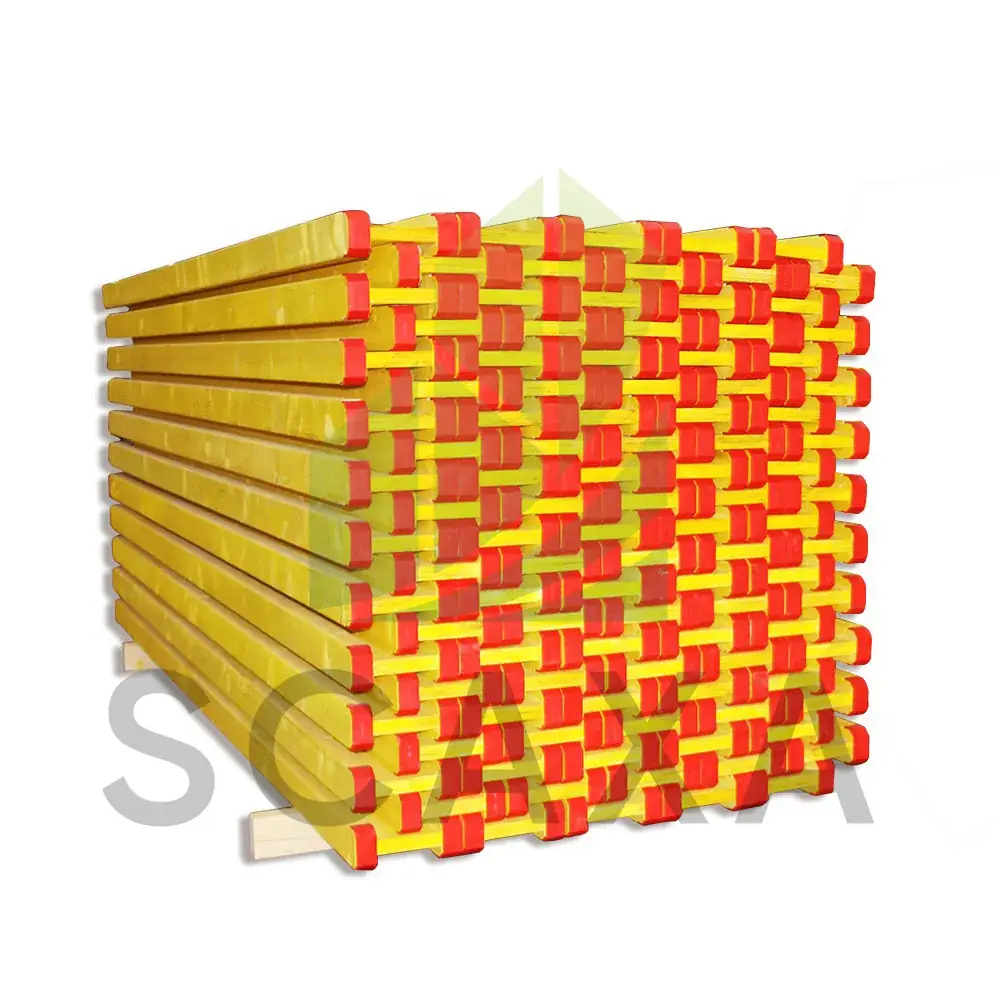 Stacked H20 decking beams with yellow and red edges, showcasing scaffolding materials from SCAXA for construction projects.