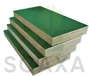 Marine plywood sheets stacked, featuring a green film face, relevant to Scaxa's scaffolding solutions for infrastructure projects.